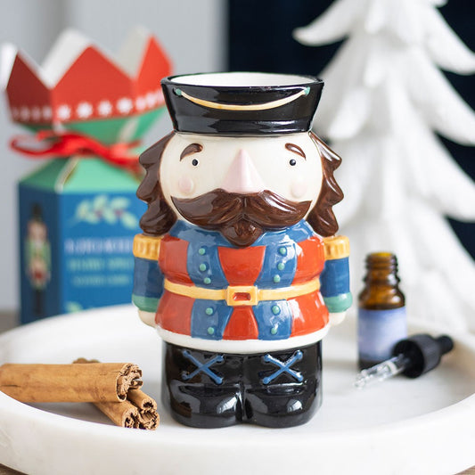 Christmas Nutcracker Tea Light Wax Burner featuring a colorful nutcracker design, perfect for festive home decor.