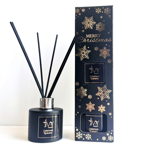 Christmas Morning Reed Diffuser in black packaging with snowflake design for holiday fragrance.