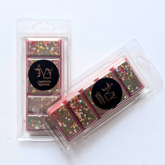 Christmas morning wax melt in colorful glitter packaging, perfect for festive holiday scents.