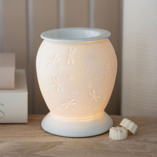 White dragonfly electric wax melt burner, glowing warm colour
