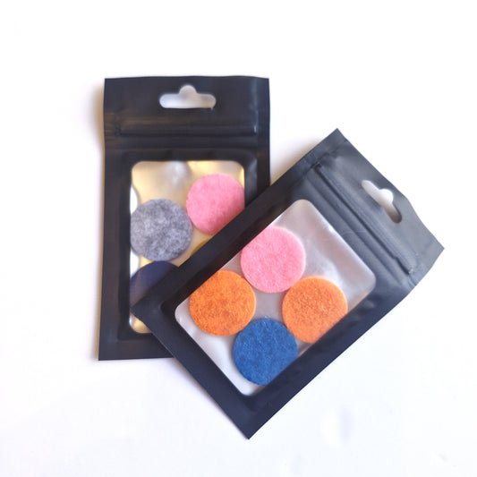 Scented Hoover Discs in colorful packages featuring fresh-scented discs designed for vacuum use.