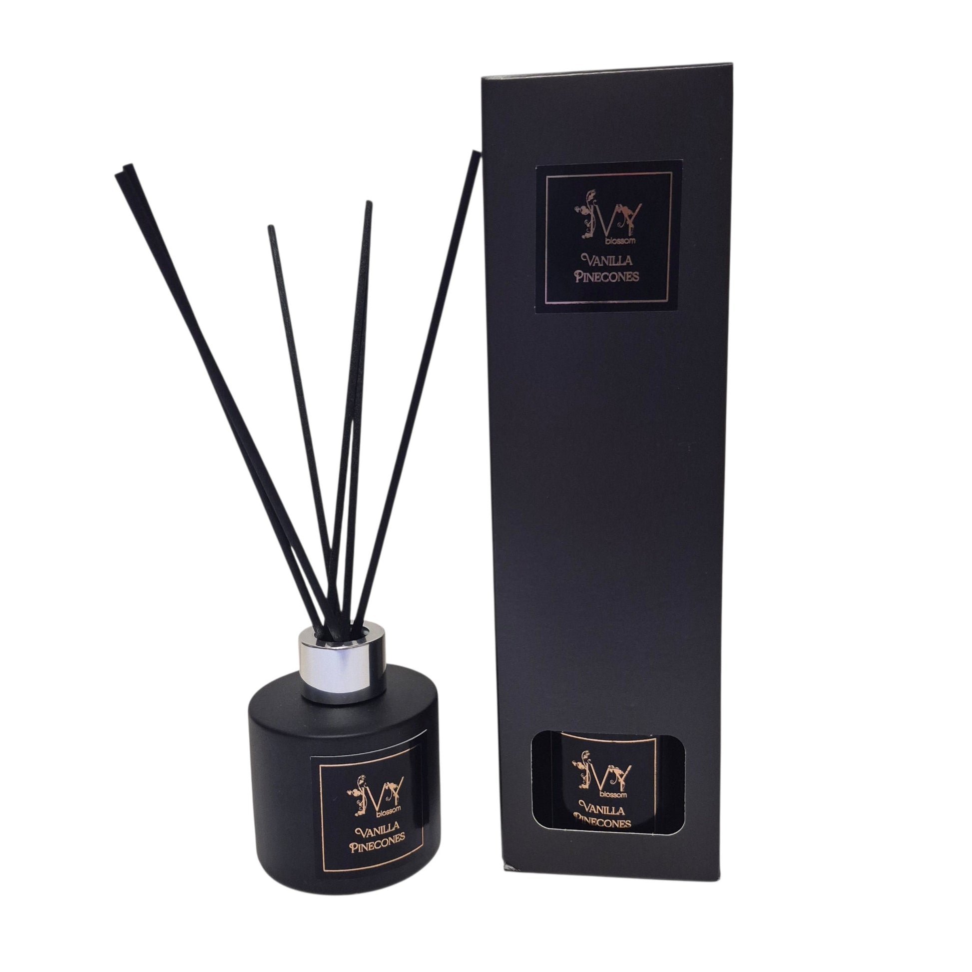 Ivy Blossom Vanilla Pinecones reed diffuser in a matte black glass bottle with black reeds and matching gift box.