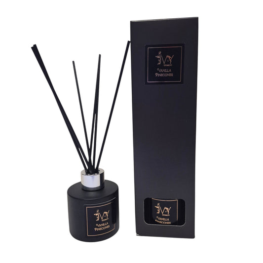 Ivy Blossom Vanilla Pinecones reed diffuser in a matte black glass bottle with black reeds and matching gift box.