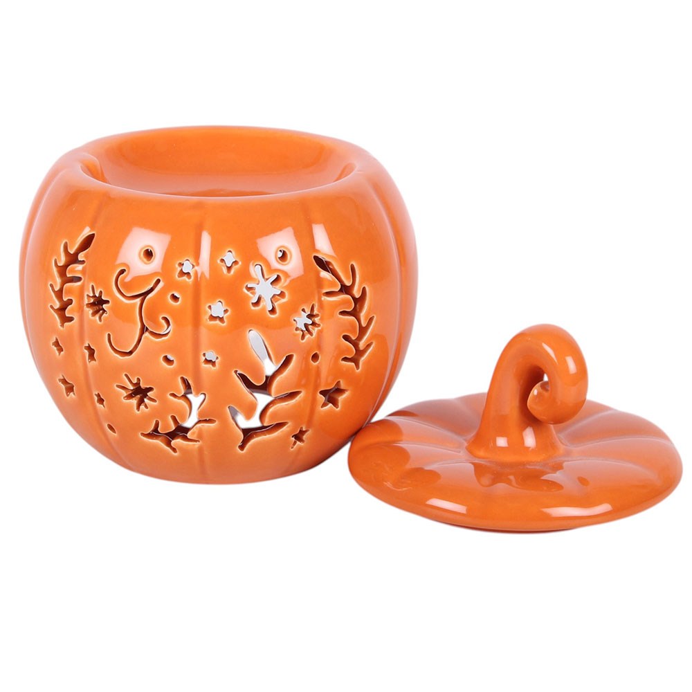 Orange Pumpkin Leaf Cut Out Tealight Wax Burner with folk-inspired cut-out details for autumn decor.