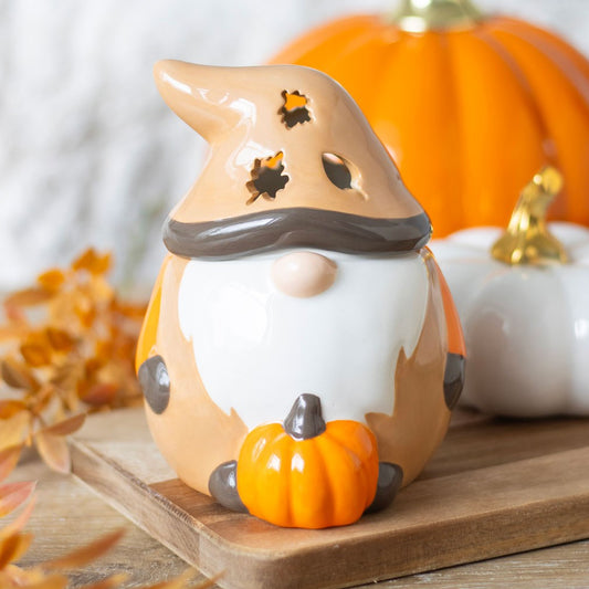 Pumpkin Autumn Gonk Tealight Wax Burner in warm orange tones, showcasing a charming gonk design and cut-out leaf details.