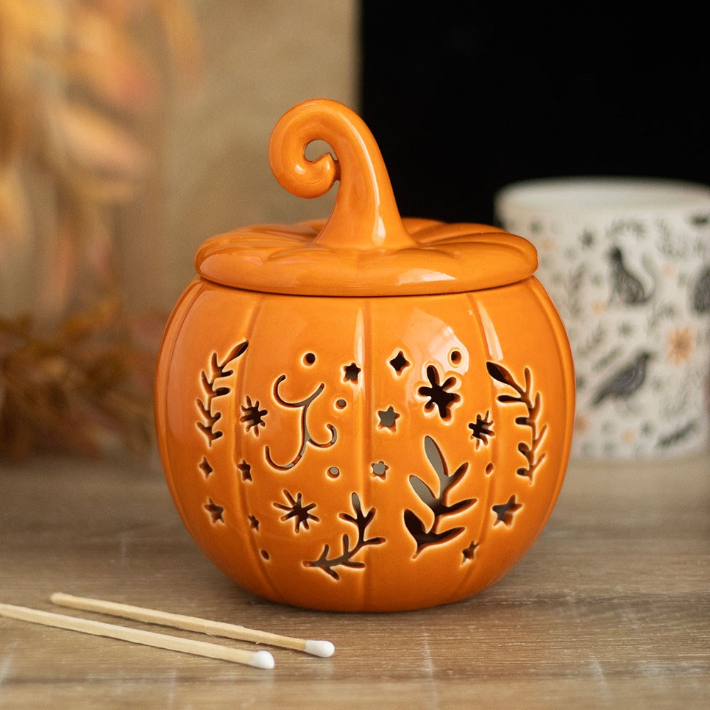 Orange Pumpkin Leaf Cut Out Tealight Wax Burner with folk-inspired cut-out details, perfect for autumn decor.