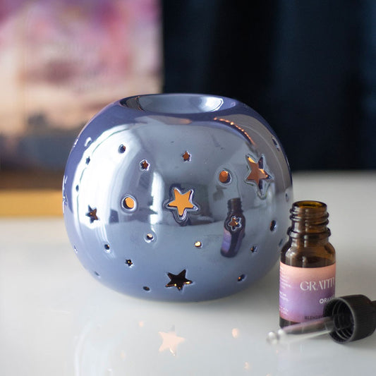 purple cut out star ceramic tealight wax burner