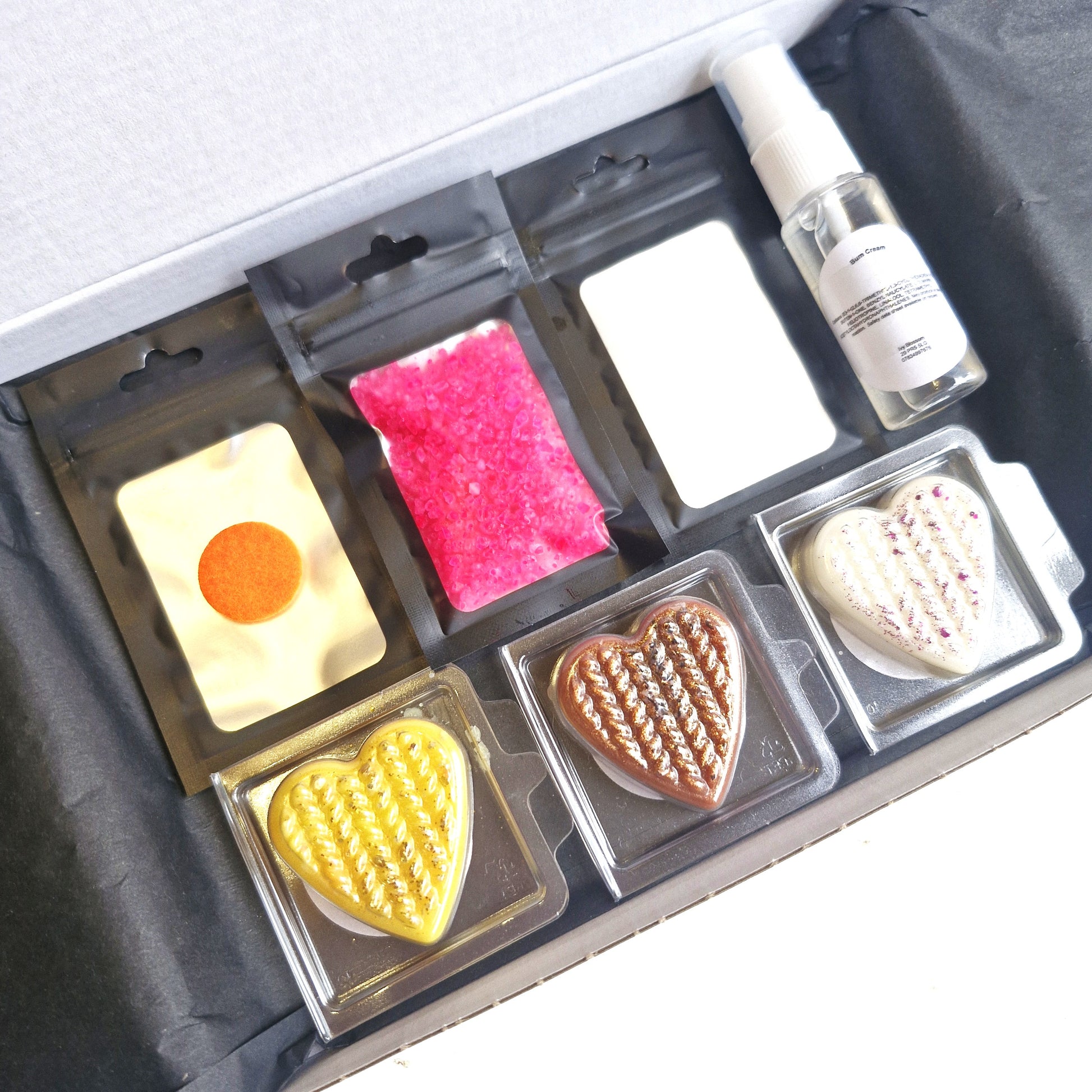 Home Fragrance Sample Bundle Boxes with wax melts, hoover discs, and scent spray in a gift box.